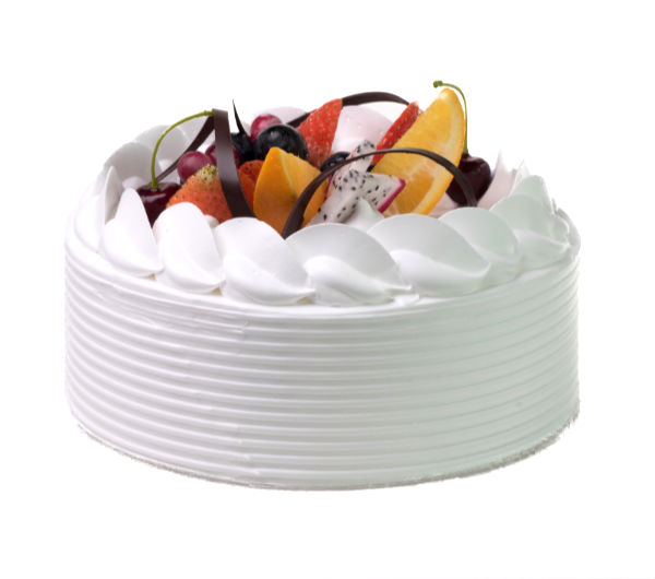white cake topped with a fruit medley