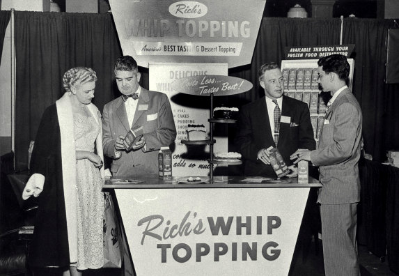 black and white image of rich products showcasing their rich's whip topping at a trade show